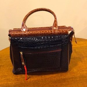 Beautiful, Samantha Brown like new, never used, black and camel dowel bag.